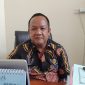 Kepala Dinas Koperasi, UMKM, dan Ketenagakerjaan Pamekasan, Muttaqin saat ditemui di ruang kerjanya.