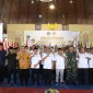 Pengurus KONI Pamekasan foto bersama Bupati dan Wakil Bupati Pamekasan beserta jajaran usai pelantikan.
