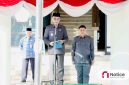 Bupati Pamekasan, KH. Kholilurrahman, bertindak sebagai inspektur upacara.