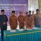 Keterangan foto: Bupati Pamekasan, KH Kholilurrahman saat melakukan penandatanganan perjanjian.