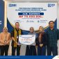 Penyerahan santunan kepada ahli waris nasabah BRI.