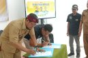PWI Pamekasan dan Dinas Perpustakaan melakukan penandatanganan MoU.